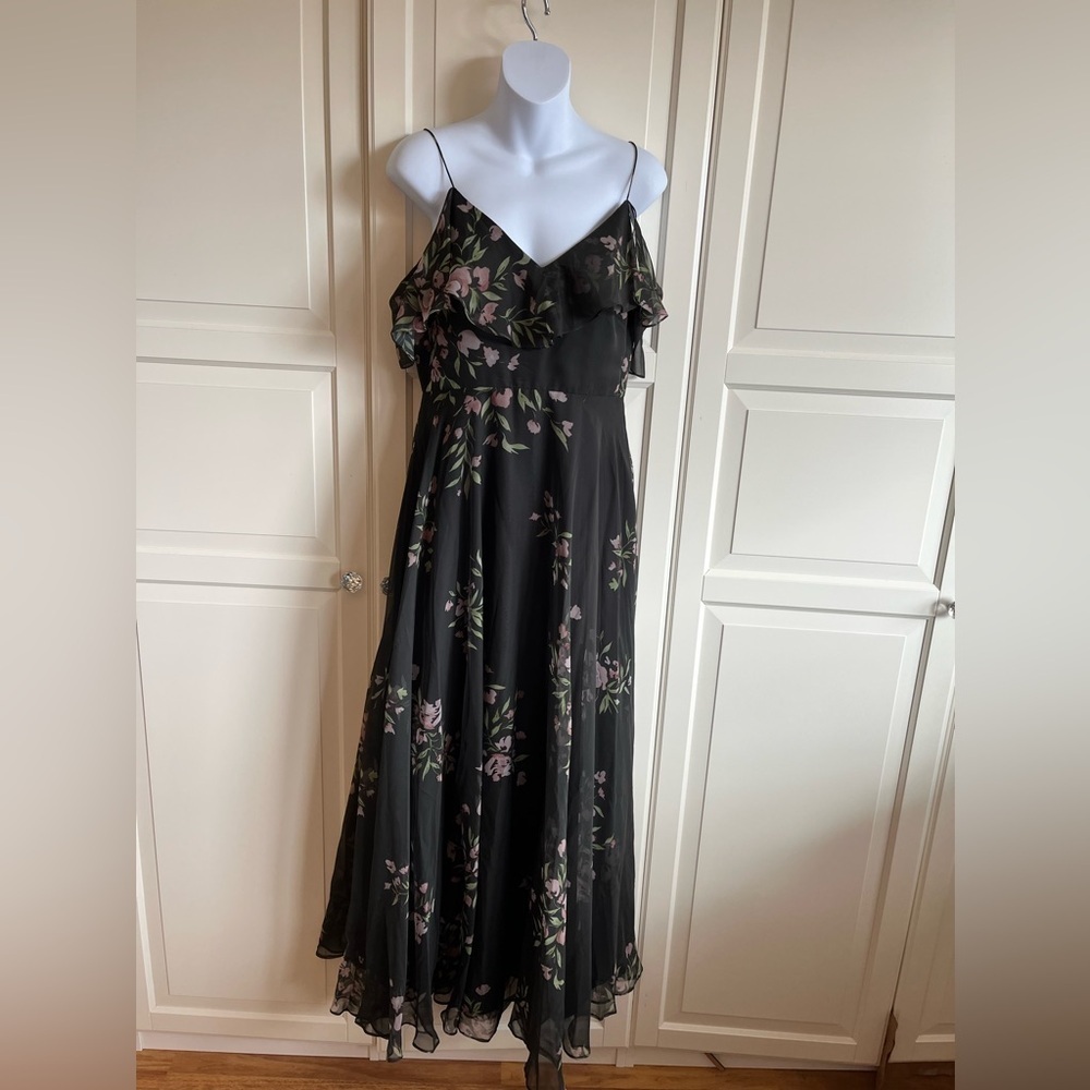 Jenny Yoo Cassie
Flutter Sleeve
Surplice Gown
Black with Floral Pattern. - Picture 14 of 16